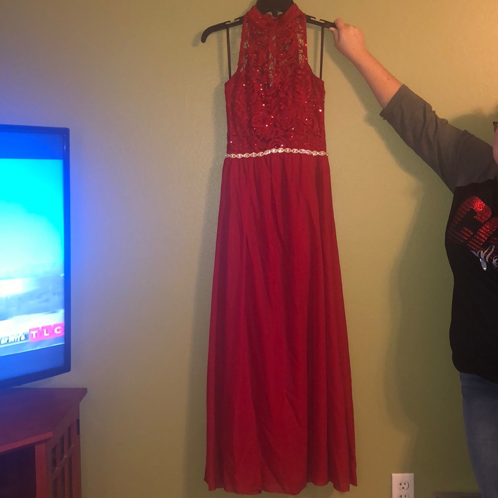 Red halter top with sparkly belt and lace dress
